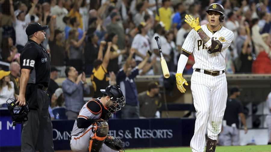 Manny Machado bat flips. Photo courtesy of San Diego Padres.