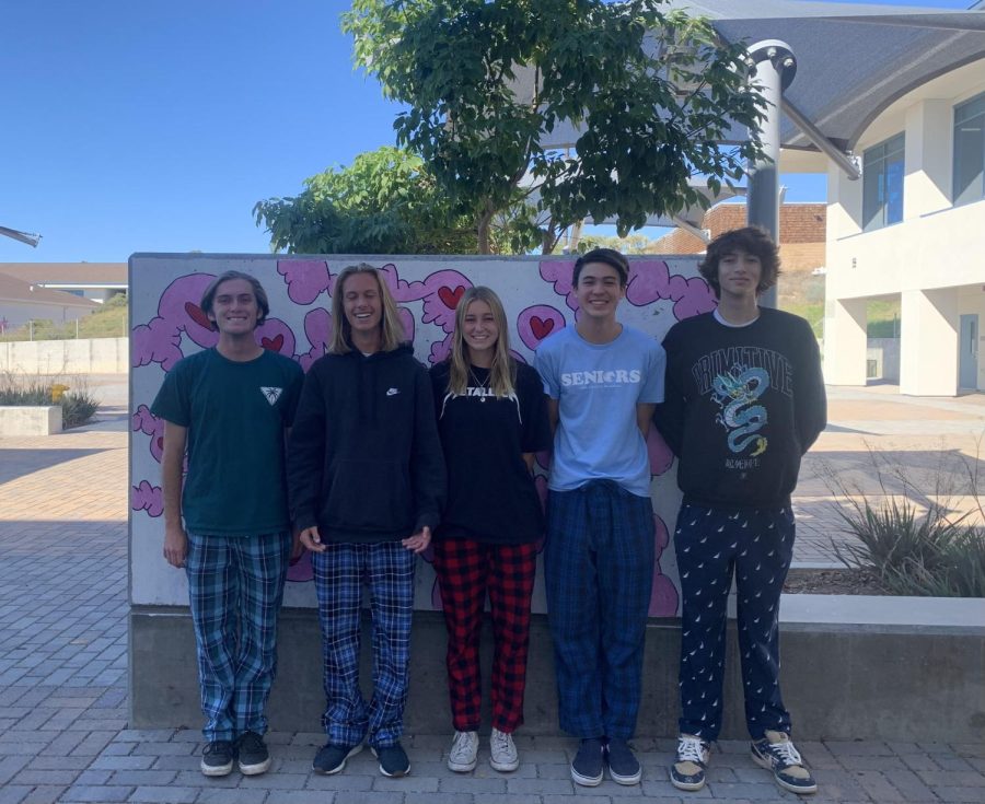 (From left) Seniors Jackson Stringfellow, Ethan Stuman, Ella Hinkle, Blake Newhouse, and Spencer Nguyen pose for a quick picture in their PJs.