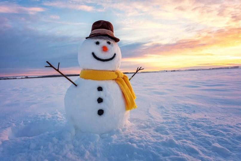 A happy snowman enjoys winter break
